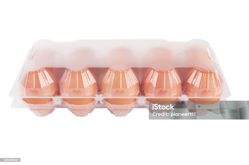 eggs Eggs in plastic box isolated on a white background 2015 Stock Photo