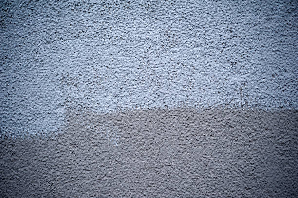 istock Texture of old wall covered with gray stucco 535009337