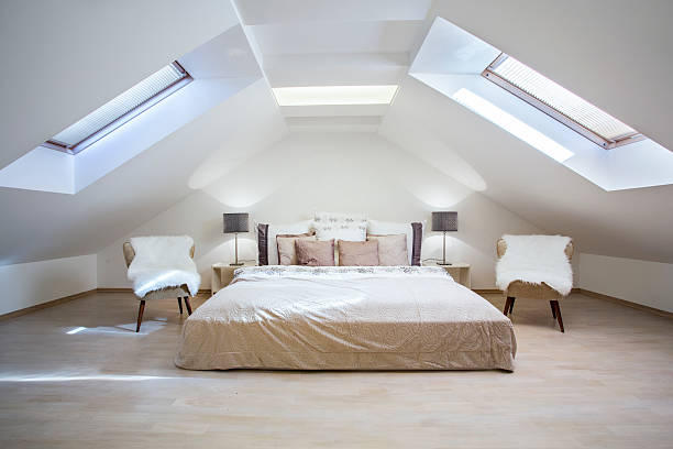 istock Bright attic bedroom in the apartment 535025487