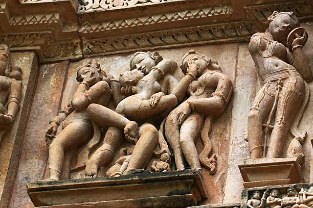 istock Khajuraho temples and their erotic sculptures, India 535025725