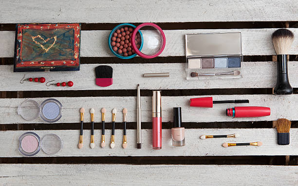istock makeup accessories on white wooden background 535025995