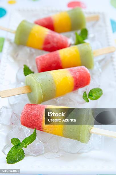 Homemade Pureed Fresh Fruit Popsicles Stock Photo - Download Image Now - 2015, Backgrounds, Berry Fruit