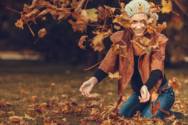 istock girl in autumn park 535026785