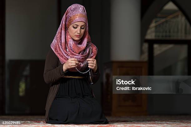 Woman Prayer At Mosque Stock Photo - Download Image Now - 2015, Adult, Adults Only