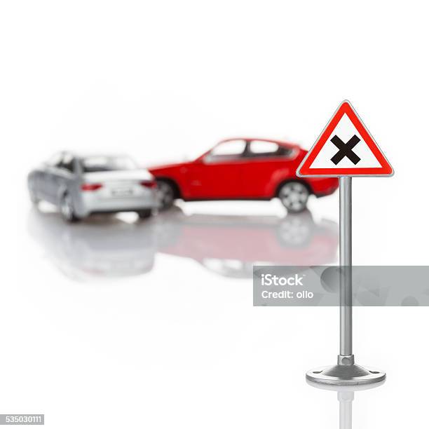 Toy Road Sign And Unrecognisable Defocused Cars Accident Stock Photo - Download Image Now