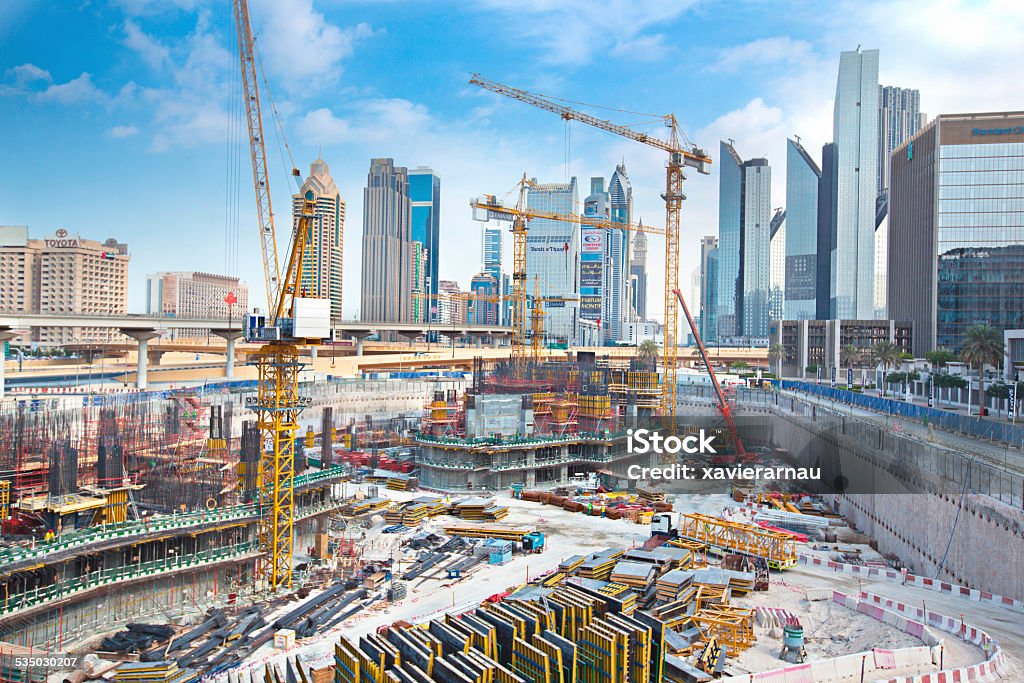 Massive construction in Dubai New construction in the financial district of Dubai. Construction Site Stock Photo