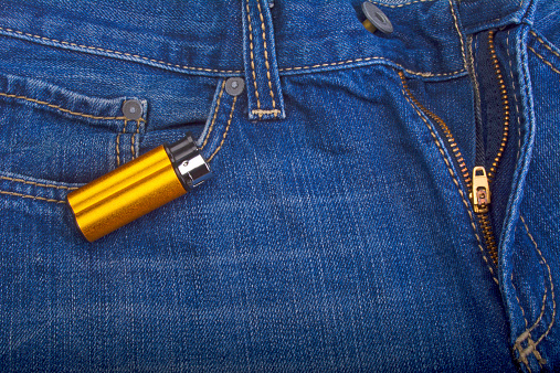 cigarette lighter on jeans