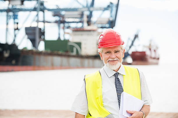 istock Confident Senior Male Architect Holding Documents At Commercial Dock 535030413