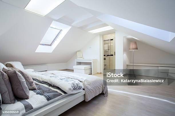 Spacious And Fashionable Bedroom Stock Photo - Download Image Now - Attic, Loft Apartment, Bedroom