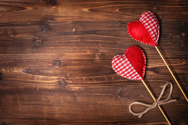 istock Valentines day hearts on wooden background 535041287