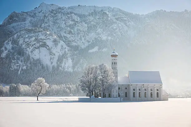 St. Coloman with trees in wintery landscape, Alps, Germany