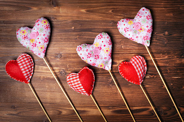 Valentines day hearts on wooden background