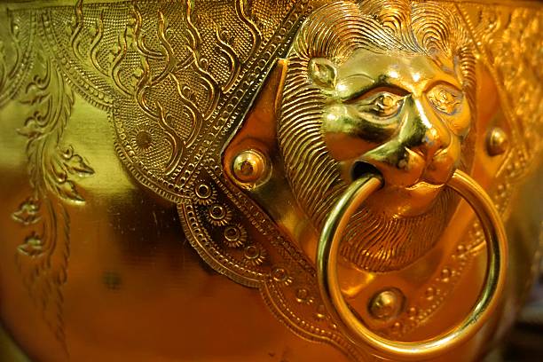 closeup golden lion bowl for use in ceremony