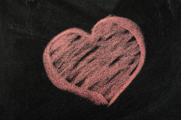 istock painted heart with chalk on a blackboard. 535043025
