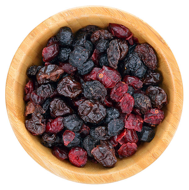 mix di bacche frutta secca. - cherry dry fruit food foto e immagini stock