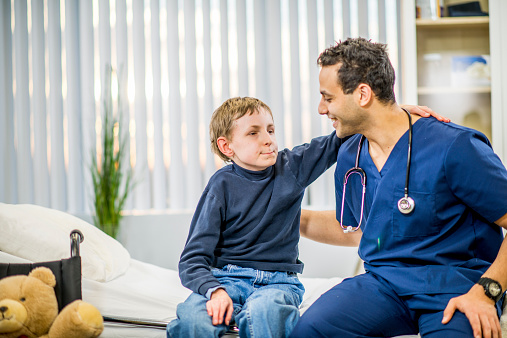 Developmental Disability Boy Boy With Developmental Disability Stock Photo - Download Image Now - 14 ...