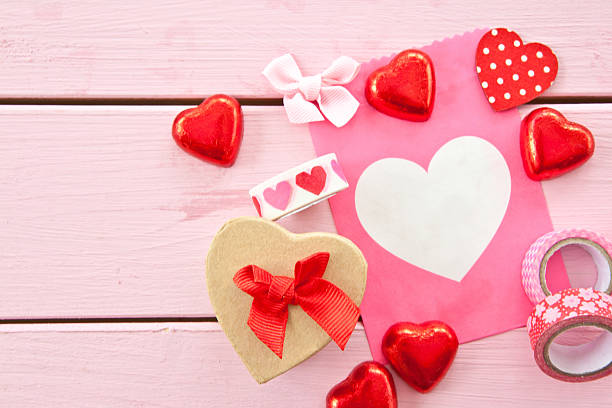 istock Chocolate hearts and colorful gift bag 535045255