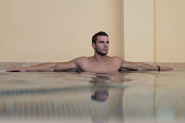 istock Male Swimmer Resting In Pool 535046445