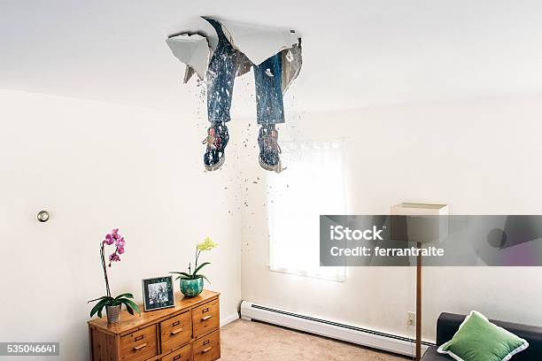 Man Breaks Ceiling Drywall While Doing Diy Stock Photo - Download Image Now - Humor, Misfortune, Failure