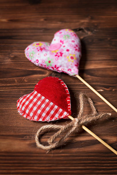 istock Valentines day hearts on wooden background 535047101