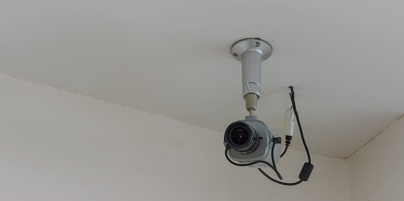 CCTV Camera on the ceiling and wall
