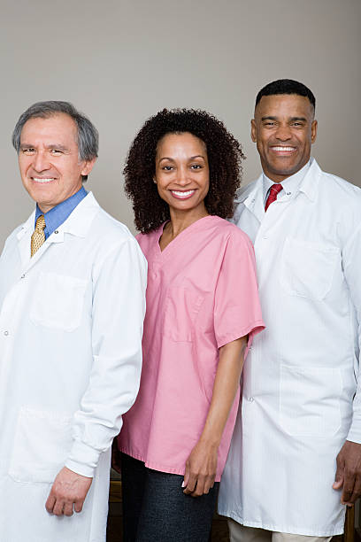 istock Two dentists and a dental nurse 535049637