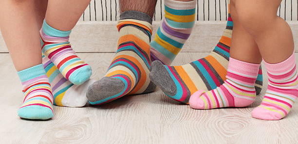 istock family in socks 535068361