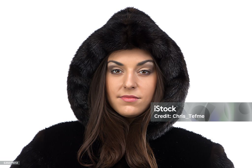 Portrait of the woman in black winter coat Portrait of the woman in black winter coat on white background 2015 Stock Photo