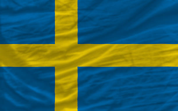 istock complete waved national flag of sweden for background 535077301