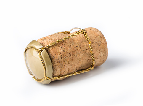 Macro photo of an isolated champagne or sparking wine cork.