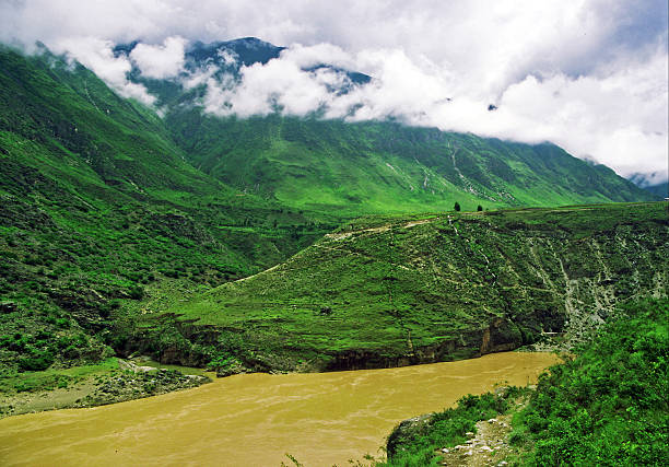 river and mountains in the mist, china stock photo