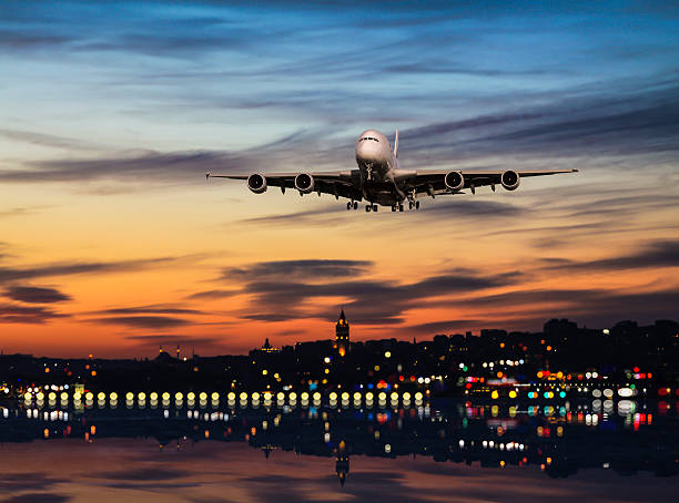 istock Airplane fly above the city 535108737