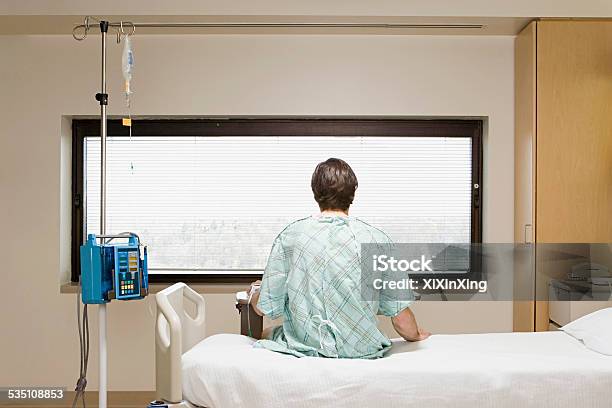 Patient On A Drip Stock Photo - Download Image Now - Hospital, Bed - Furniture, Sitting