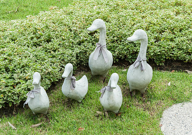 istock Ceramic ducks decoration sculpture on green grass 535109015