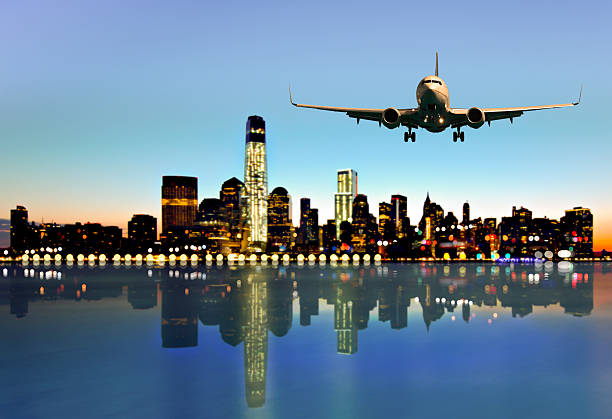 istock Airplane fly above the city 535110593