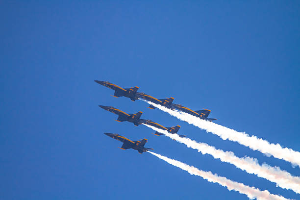 us navy blue angels squadron - fomration stock-fotos und bilder