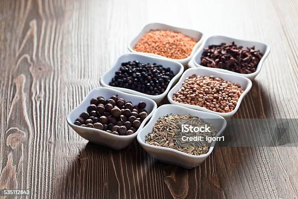 Spices On Wooden Table Stock Photo - Download Image Now - 2015, Allspice, Backgrounds