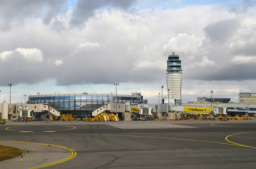 Schwechat, Austria - January 14th 2012: Docking stations, terminal and new tower on the Vienna Airport