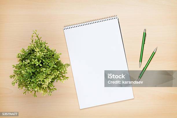 Blank Notepad Pen And Flower On Wooden Table Stock Photo - Download Image Now - 2015, Above, Blank