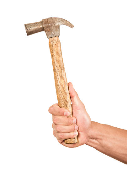 istock closeup of hand holding a hammer 535115381