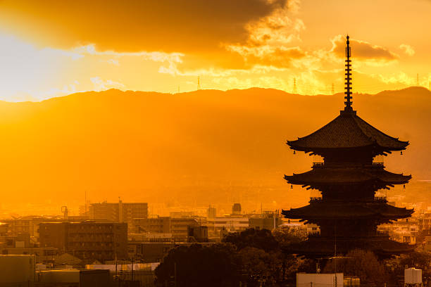 Kyoto, Japan - December 2, 2014: Toji Pagoda and Kyoto skyline at sunset. The pagoda is the tallest in the country.