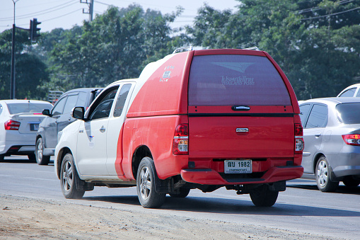 Chiangmai, Thailand -December 20, 2014:  Pick up truck of Thailand Post. Photo at road no.121 about 8 km from downtown Chiangmai, thailand.