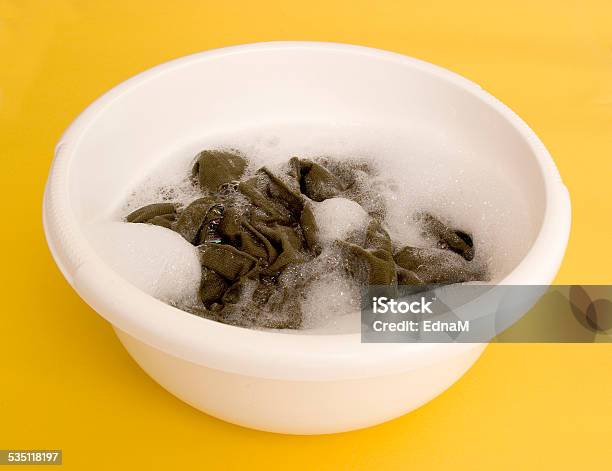 Laundry For Bleaching In A Plastic Bowl Stock Photo - Download Image Now - 2015, Bowl, Cut Out