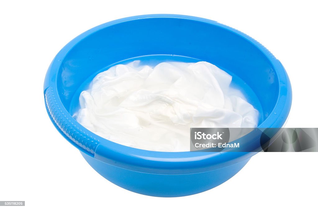 Laundry for bleaching in a plastic bowl 2015 Stock Photo