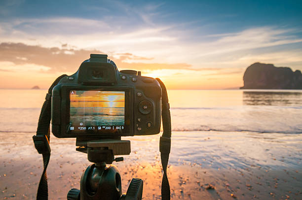 istock DSLR camera at  the beach scenery 535118275