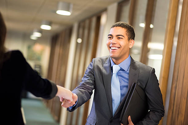istock young man shakes hands with his potential new boss 535162469