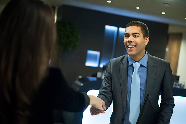 istock young man shakes hands with his potential new boss 535162481