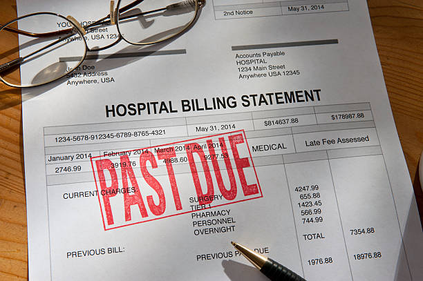 Physician Medical Hospital Past Due Bill Hospital Billing statement.  Past Due stamped on the invoice. past due stock pictures, royalty-free photos & images