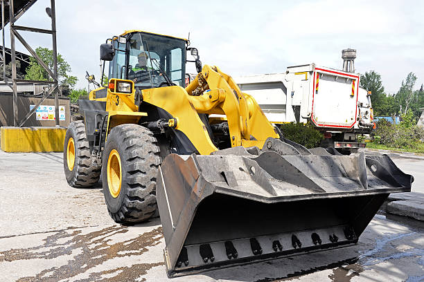 Excavator at parking lot