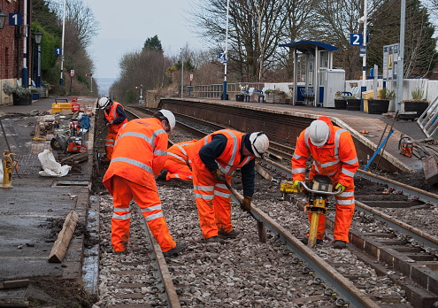 Nunthorpe,UK - February 1, 2015: Network Rail maintenance team at work repairing a level crossing on the Esk Valley Railway